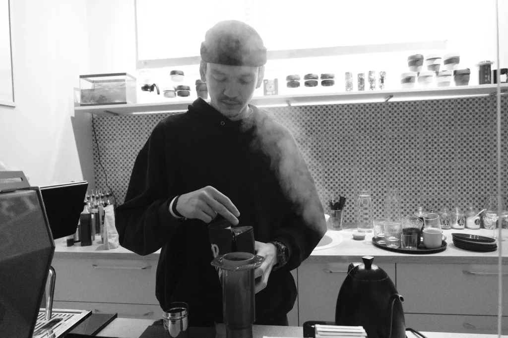 AeroPress coffee press plunger during manual brewing