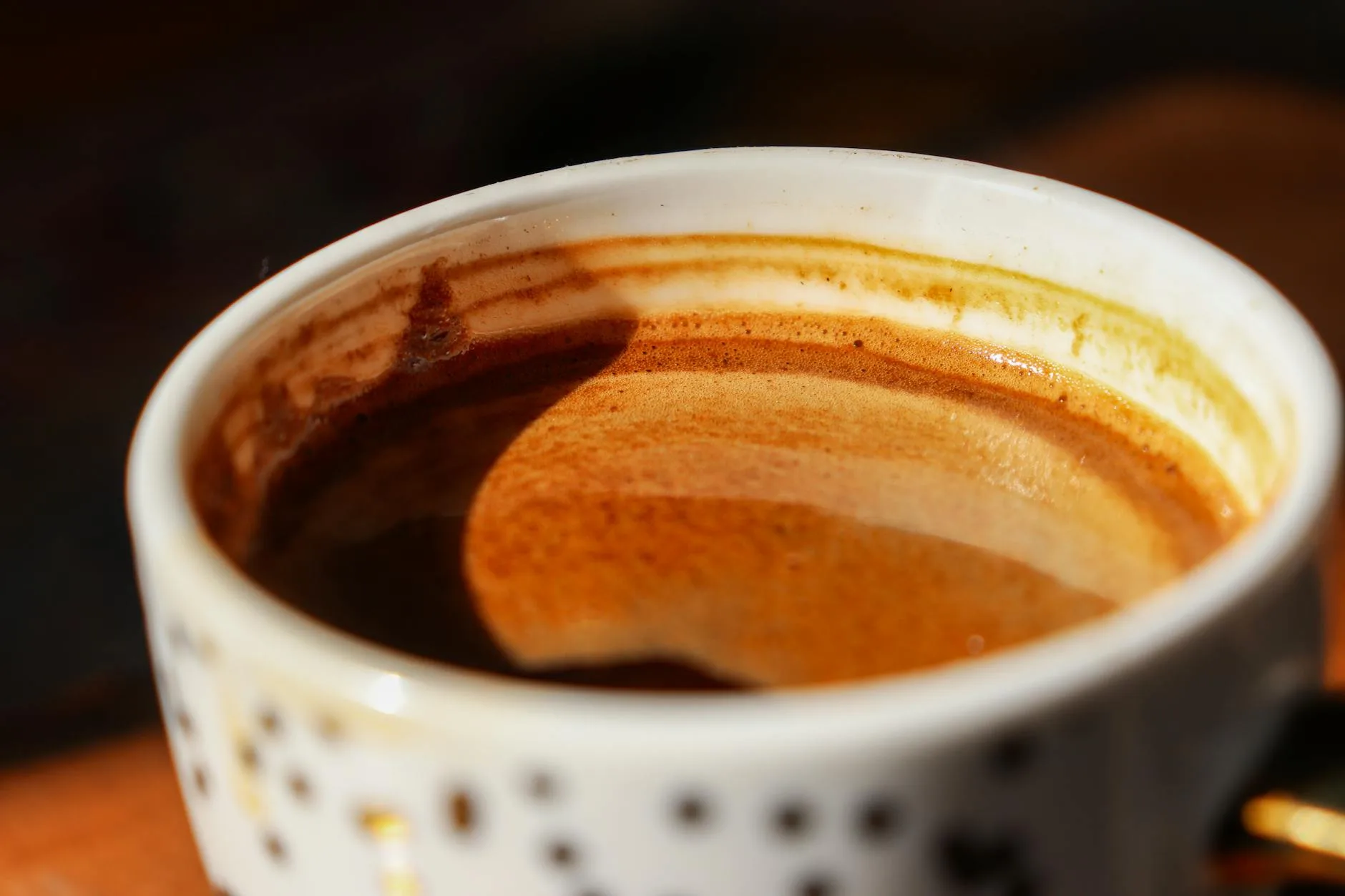 Espresso shot with rich crema in a ceramic cup