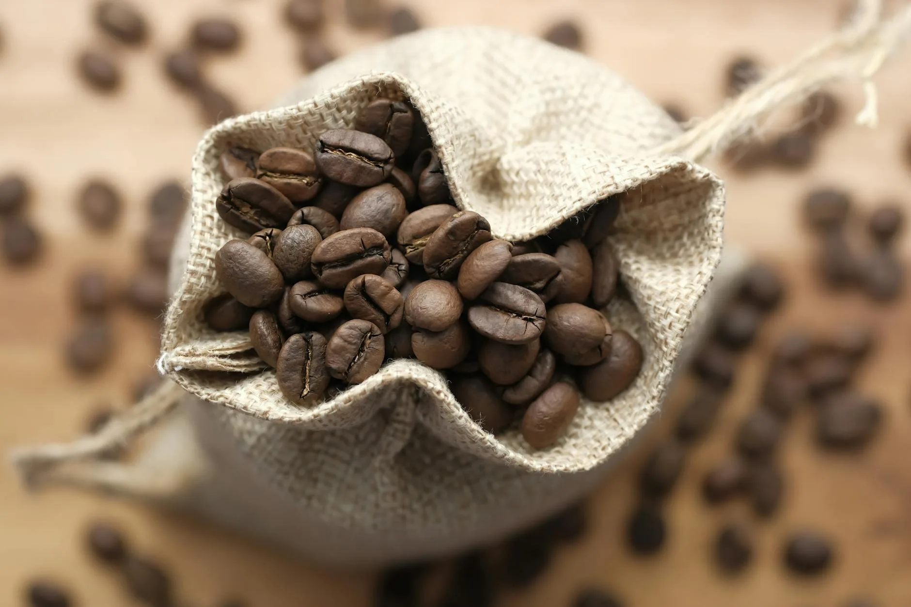 Freshly roasted coffee beans on a wooden table