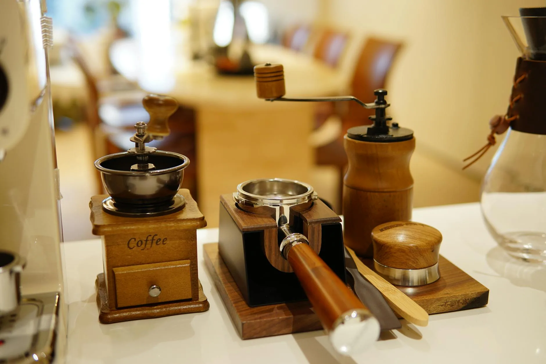 Manual hand coffee grinder being used for fresh coffee