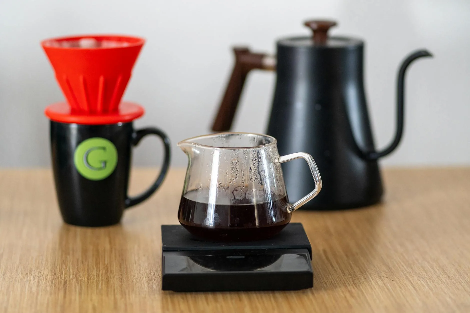 Pour-over coffee brewing setup with V60 dripper and server