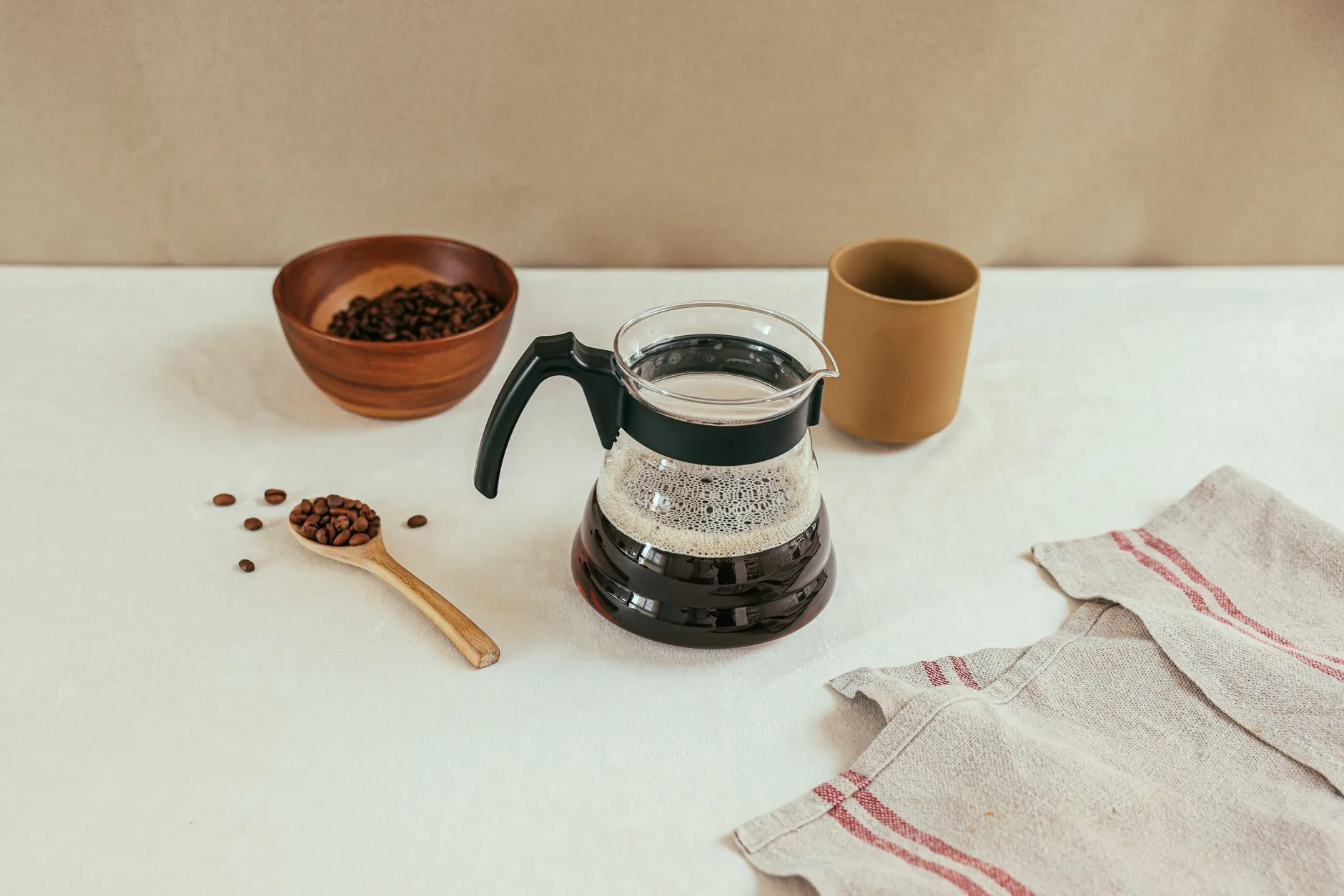 Fresh brewed decaf coffee cup with roasted beans