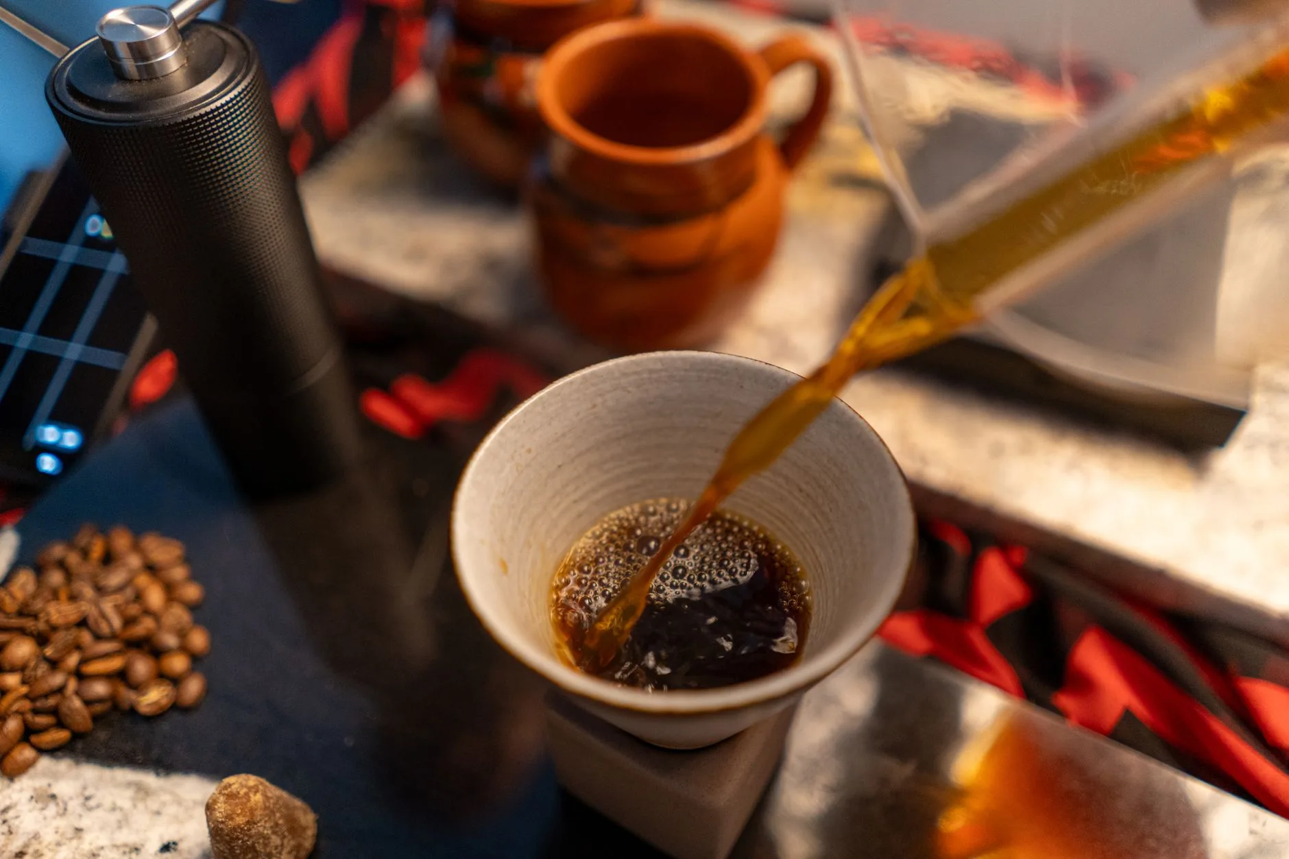 Manual coffee grinder with beans for quieter morning coffee