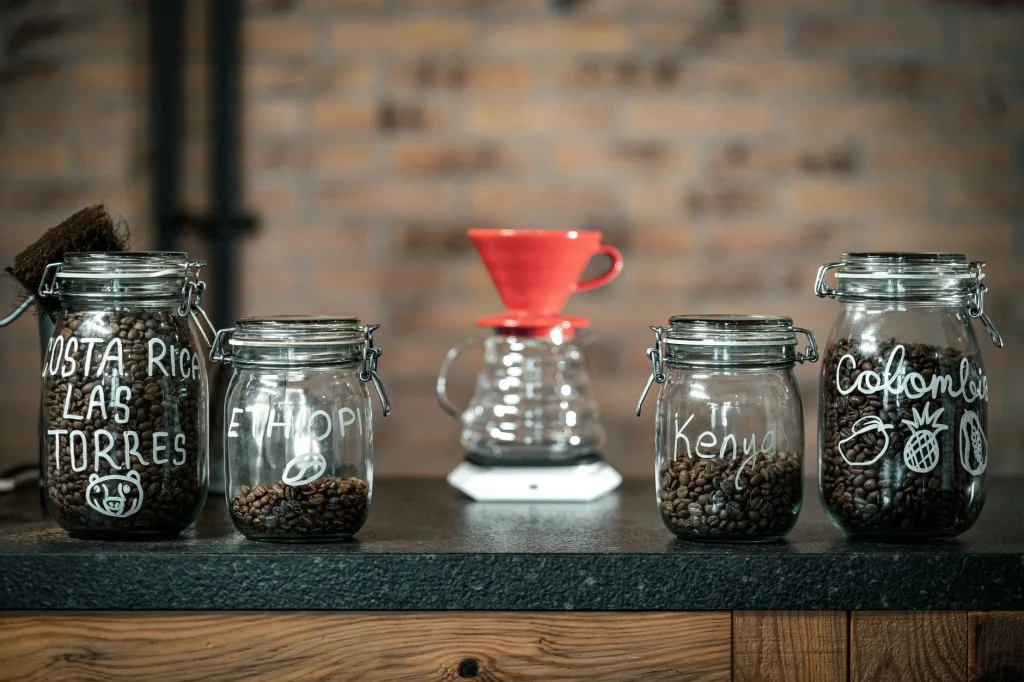 Coffee beans in separate bags on a cafe counter