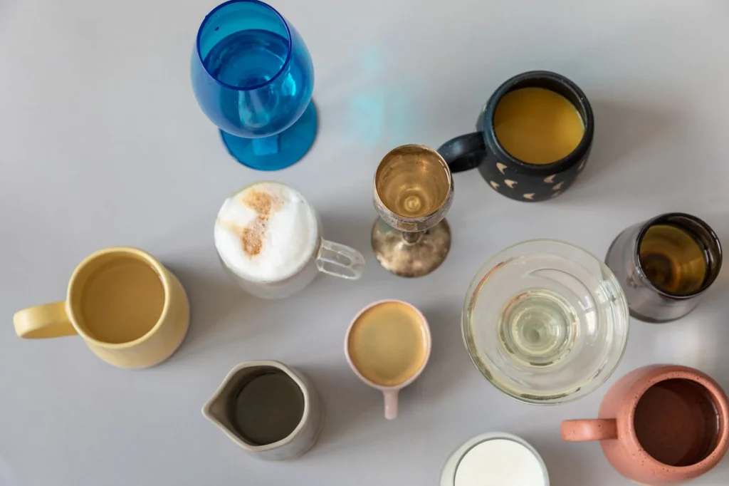 Different ceramic coffee cups showing how shape affects coffee taste